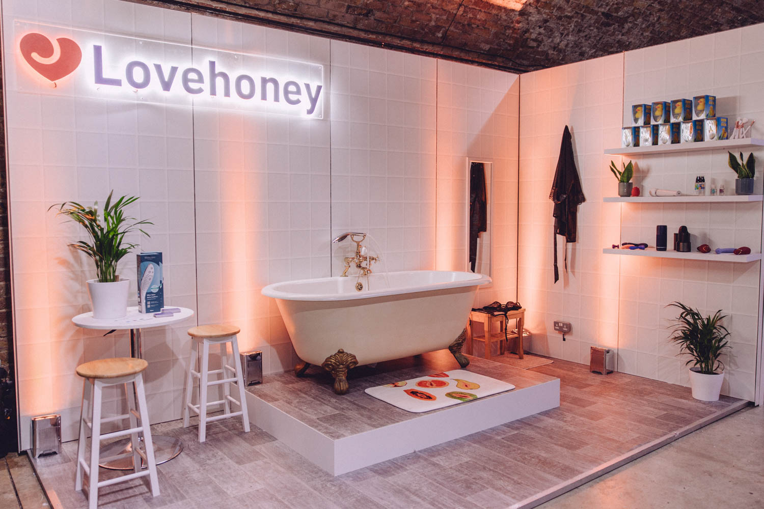 Lovehoney premium showcase stand with bath tub at the bCreator Health & Wellbeing Show